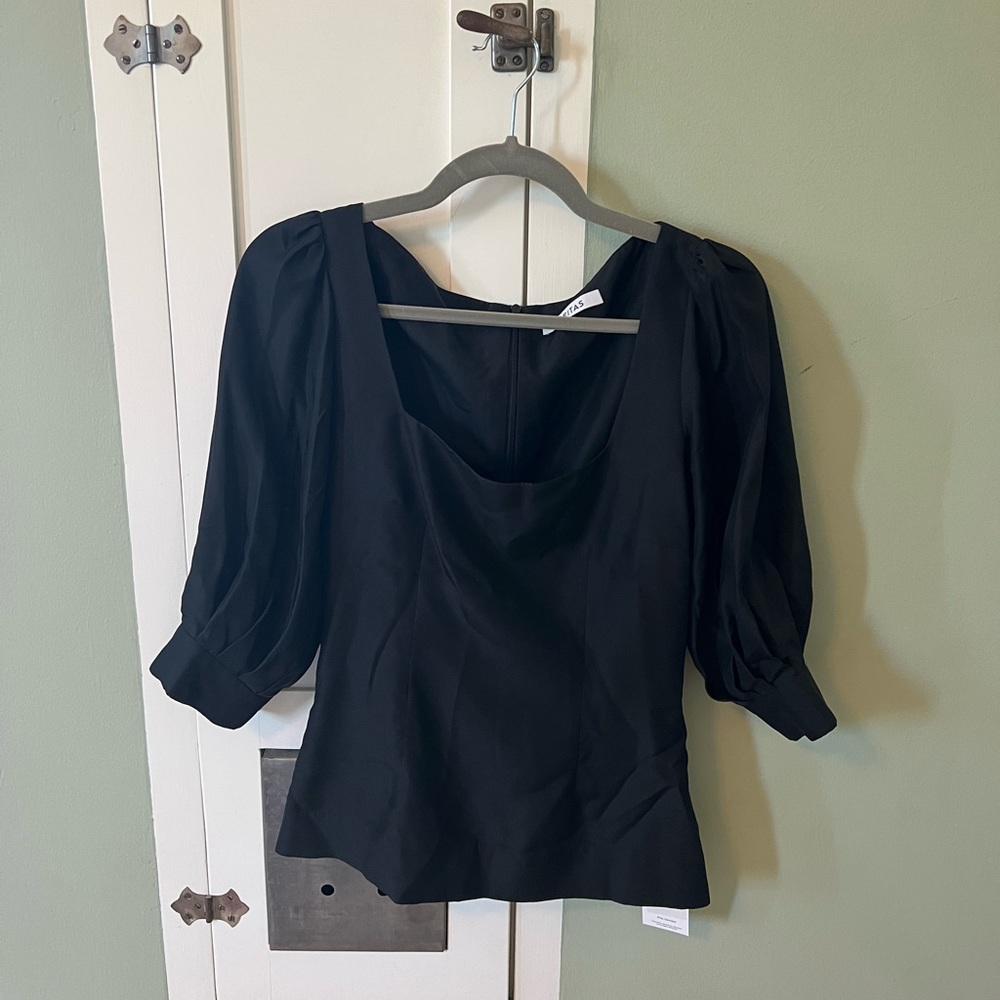 Deitas silk blouse in black with puff sleeves